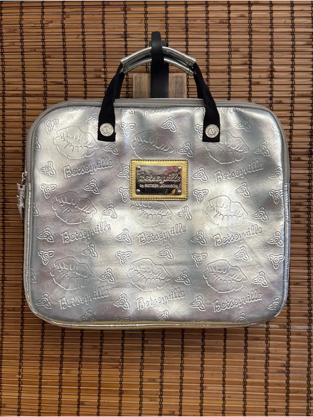 Betseyville Silver Metallic Laptop Bag Embossed Lip and Flaral Pattern